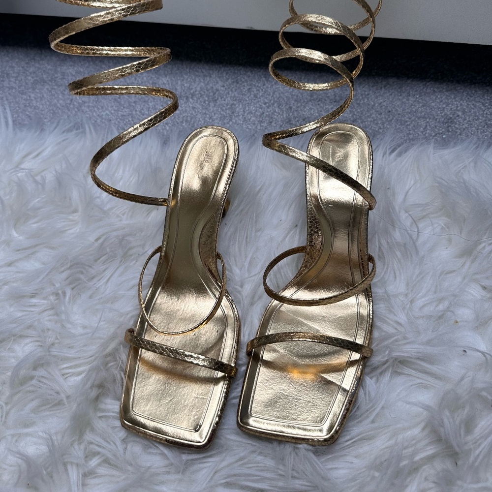 Zara strappy heel in gold and size 39.